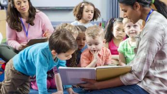 teacher reading to kids