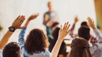 Secondary Classroom Hands Raised