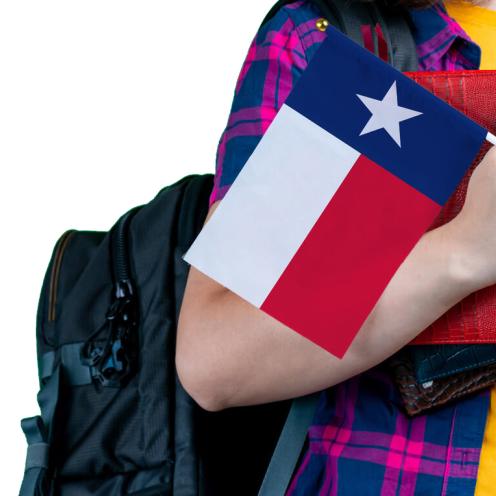 Student holding Texas flag.