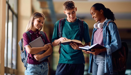 Three students in hallway.