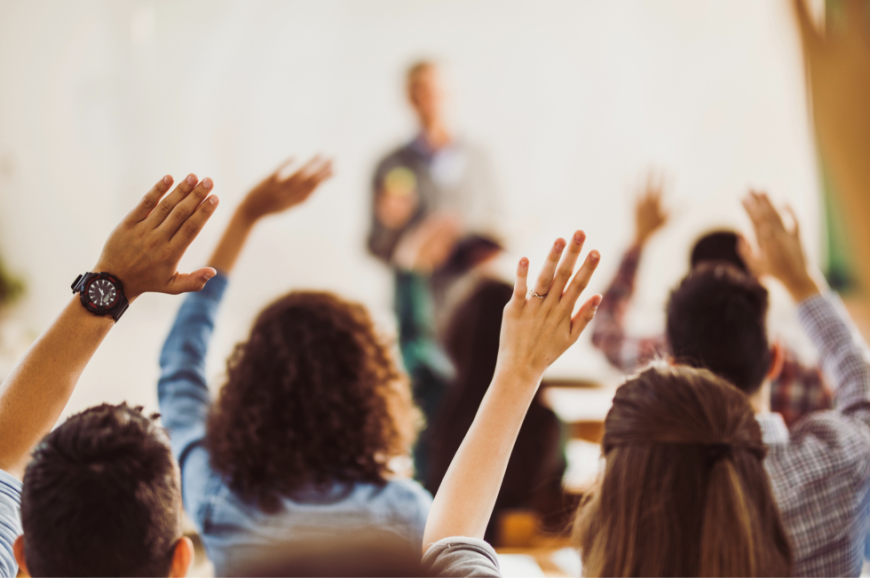 Secondary Classroom Hands Raised
