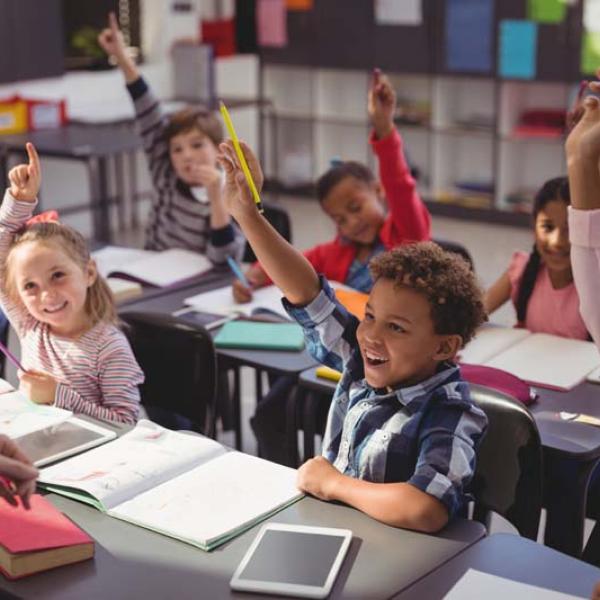 kids raising hands